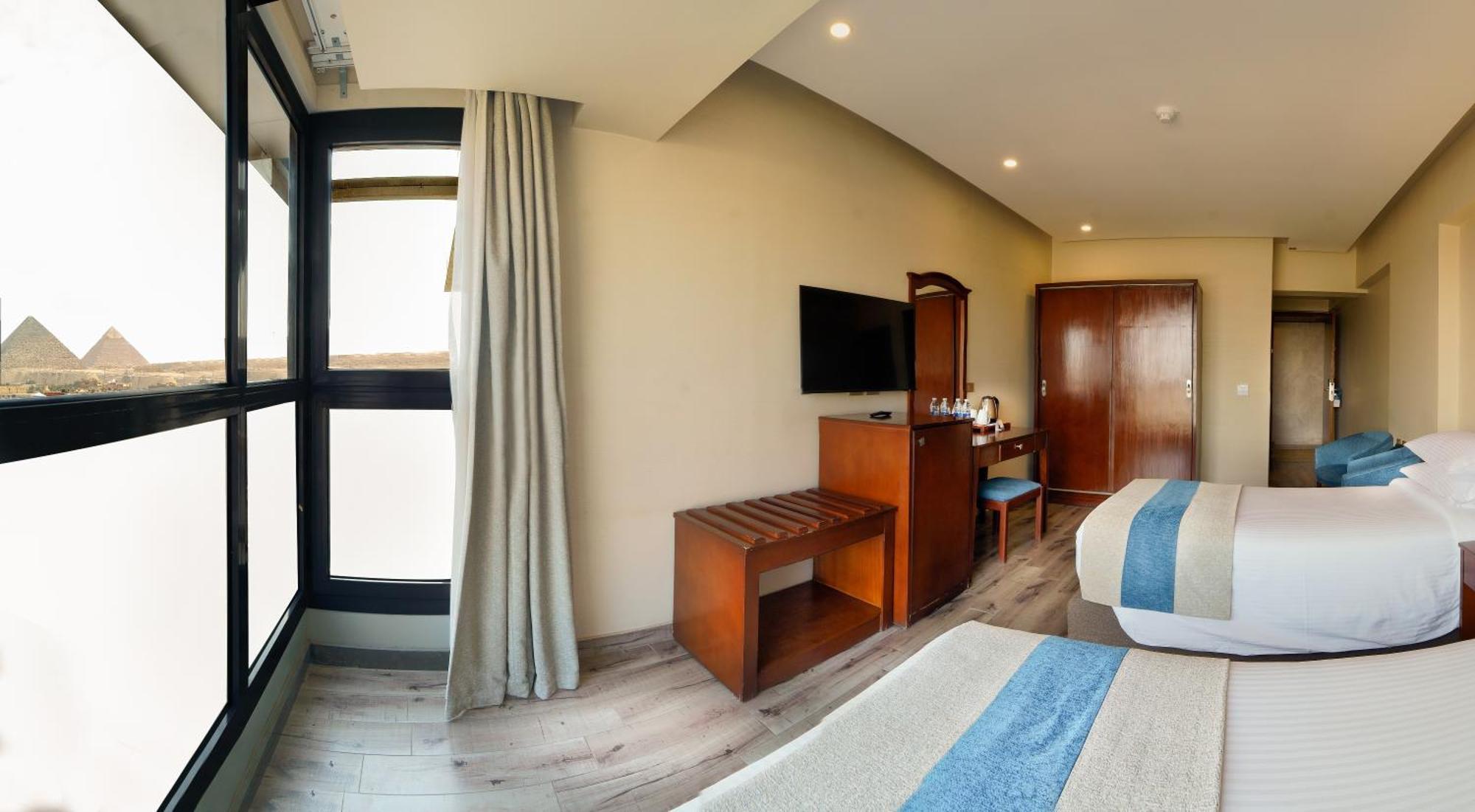 Stay Inn Pyramids Hotel Al Kawm al Akhdar 外观 照片